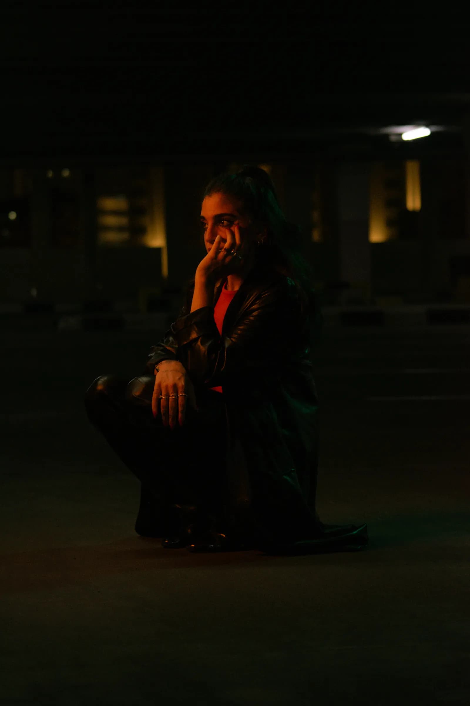 Portrait in deep red light at night